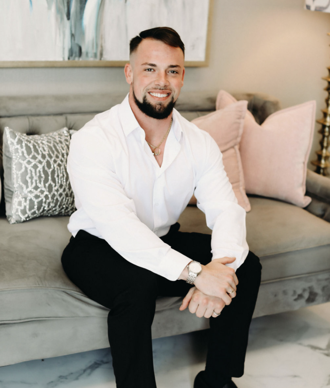 Kenneth Goolsby, owner of Uplift Medical, in a tailored white shirt